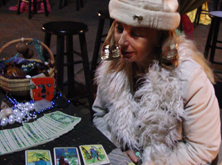 Voodoo Priestess Severina reading tarot cards